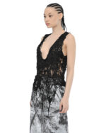 Fiber Bond Deficient Sleeveless Top